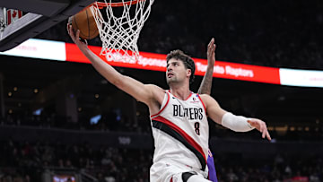 Apr 3, 2025; Toronto, Ontario, CAN; Portland Trail Blazers forward Deni Avdija (8) goes up to make a basket against the Toronto Raptors during the second half at Scotiabank Arena. Mandatory Credit: John E. Sokolowski-Imagn Images