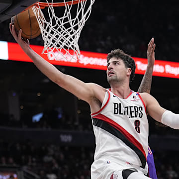 Apr 3, 2025; Toronto, Ontario, CAN; Portland Trail Blazers forward Deni Avdija (8) goes up to make a basket against the Toronto Raptors during the second half at Scotiabank Arena. Mandatory Credit: John E. Sokolowski-Imagn Images