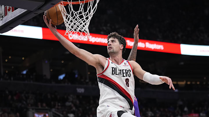 Apr 3, 2025; Toronto, Ontario, CAN; Portland Trail Blazers forward Deni Avdija (8) goes up to make a basket against the Toronto Raptors during the second half at Scotiabank Arena. Mandatory Credit: John E. Sokolowski-Imagn Images