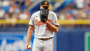 Jun 9, 2024; St. Petersburg, Florida, USA;  Baltimore Orioles pitcher Grayson Rodriguez (30) reacts after giving up a run against the Tampa Bay Rays in the sixth inning at Tropicana Field. Mandatory Credit: Nathan Ray Seebeck-Imagn Images