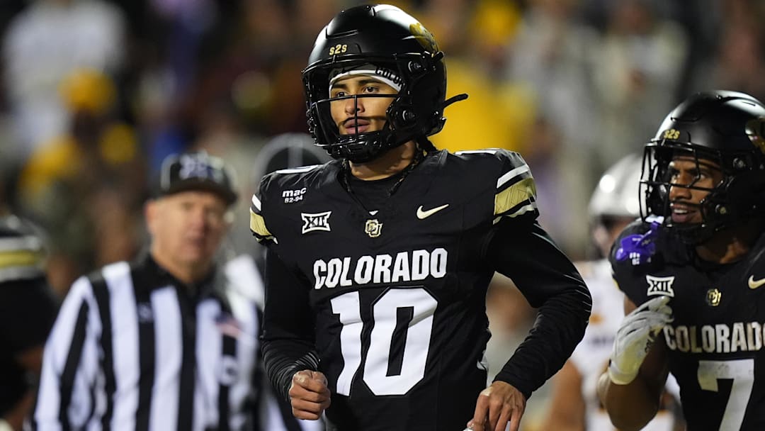 Nov 22, 2025; Boulder, Colorado, USA; Colorado Buffaloes quarterback Julian Lewis (10) following his third quarter touchdown against the Arizona State Sun Devils at Folsom Field. Mandatory Credit: Ron Chenoy-Imagn Images