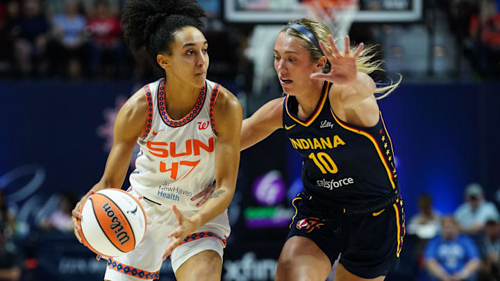Connecticut Sun guard Leila Lacan (47) drives the ball against Indiana Fever guard Lexie Hull (10) in the first half at Mohegan Sun Arena. Connecticut Sun guard Leila Lacan (47) drives the ball against Indiana Fever guard Lexie Hull (10) in the first half at Mohegan Sun Arena.