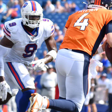 Aug 20, 2022; Orchard Park, New York, USA; Buffalo Bills linebacker Andre Smith (9) tries to chase down Denver Broncos quarterback Brett Rypien (4) in the fourth quarter of a pre-season game at Highmark Stadium. Mandatory Credit: Mark Konezny-USA TODAY Sports