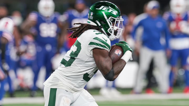 Sep 11, 2023; East Rutherford, New Jersey, USA; New York Jets running back Dalvin Cook (33) carries the ball against the Buffalo Bills during the first half at MetLife Stadium. Mandatory Credit: Vincent Carchietta-USA TODAY Sports