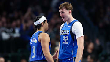 Dec 3, 2025; Dallas, Texas, USA;  Dallas Mavericks forward Cooper Flagg (32) celebrates with Dallas Mavericks guard Ryan Nembhard (9) after scoring during the fourth quarter against the Miami Heat at American Airlines Center. Mandatory Credit: Kevin Jairaj-Imagn Images