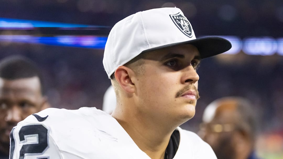 Aug 23, 2025; Glendale, Arizona, USA; Las Vegas Raiders quarterback Aidan O'Connell (12) against the Arizona Cardinals during a preseason NFL game at State Farm Stadium. Mandatory Credit: Mark J. Rebilas-Imagn Images