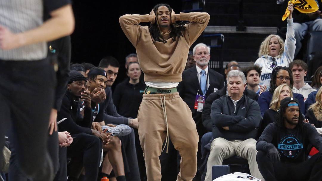 Jan 31, 2026; Memphis, Tennessee, USA; Memphis Grizzlies guard Ja Morant (12) reacts during the fourth quarter against the Minnesota Timberwolves at FedExForum. Mandatory Credit: Petre Thomas-Imagn Images