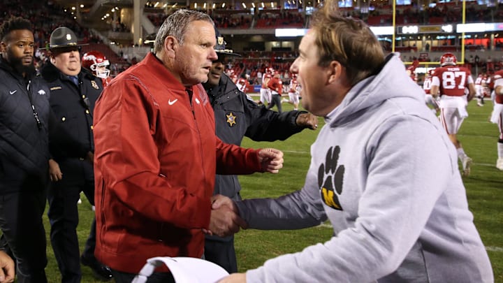 Arkansas Razorbacks head coach Sam Pittman shakes hands with Missouri Tigers head coach Eil Drinkwitz after the game at Donald W. Reynolds Razorbacks Stadium. Arkansas won 34-17. Arkansas Razorbacks head coach Sam Pittman shakes hands with Missouri Tigers head coach Eil Drinkwitz after the game at Donald W. Reynolds Razorbacks Stadium. Arkansas won 34-17.