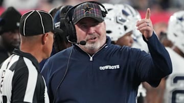  Dallas Cowboys head coach Mike McCarthy speaks with a referee against the New York Giants at MetLife Stadium.