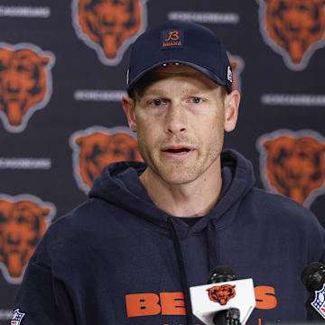 Chicago Bears head coach Ben Johnson (R) speaks during the Rookie Minicamp at Halas Hall