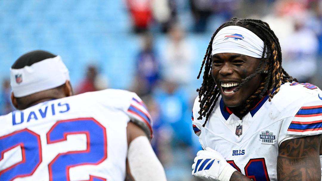 Oct 26, 2025; Charlotte, North Carolina, USA; Buffalo Bills running back Ray Davis (22) celebrates with cornerback Maxwell Hairston (31) after a game against the Carolina Panthers at Bank of America Stadium. Mandatory Credit: Bob Donnan-Imagn Images