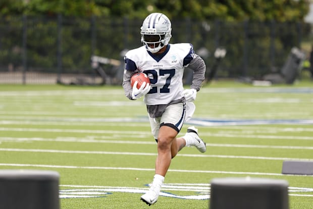 Cowboys running back Miles Sanders goes through a drill during practice at the Ford Center at the Star