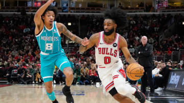 Jan 5, 2024; Chicago, Illinois, USA; Chicago Bulls guard Coby White (0) dribbles against Charlotte