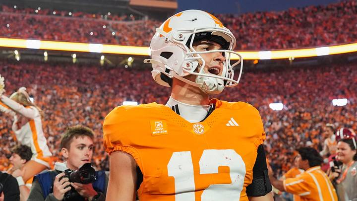 Tennessee quarterback George MacIntyre (12) looks on after the field is rushed after a football game between Tennessee and Alabama at Neyland Stadium in Knoxville, Tenn., on Oct. 17, 2026.