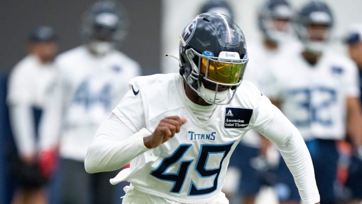 Outside linebacker Arden Key (49) runs through drills during the Tennessee Titans mandatory mini-camp at Ascension Saint Thomas Sports Park in Nashville, Tenn., Tuesday, June 4, 2024.