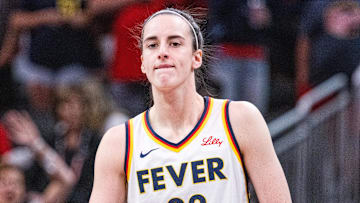 Jul 9, 2025; Indianapolis, Indiana, USA; Indiana Fever guard Caitlin Clark (22) in the first half against Golden State Valkyries at Gainbridge Fieldhouse. Mandatory Credit: Trevor Ruszkowski-Imagn Images