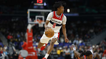 Jan 12, 2025; Washington, District of Columbia, USA; Washington Wizards guard Bub Carrington (8) dribbles the ball past Oklahoma City Thunder guard Cason Wallace (22) in the second quarter at Capital One Arena. Mandatory Credit: Geoff Burke-Imagn Images