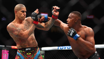 Apr 13, 2024; Las Vegas, Nevada, USA; Alex Pereira (red gloves) fights Jamahal Hill (blue gloves) during UFC 300 at T-Mobile Arena. Mandatory Credit: Mark J. Rebilas-USA TODAY Sports