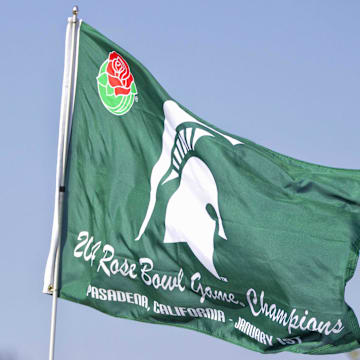 Oct 25, 2014; East Lansing, MI, USA; General view Rose bowl flag flying over stadium  prior to a game between the Michigan Wolverines and Michigan State Spartans at Spartan Stadium. Mandatory Credit: Mike Carter-Imagn Images