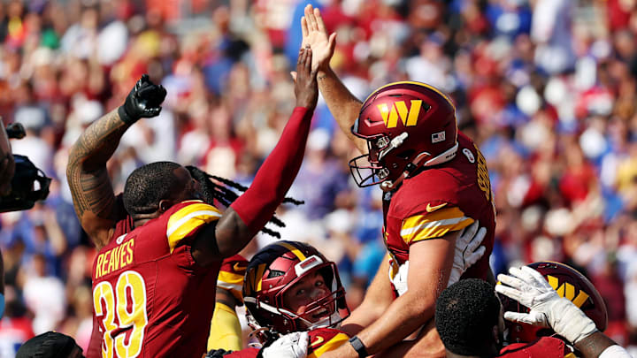 Sep 15, 2024; Landover, Maryland, USA; Washington Commanders place kicker Austin Seibert (3) celebrates with his teammates after making the game winning field goal against the New York Giants at Commanders Field. Mandatory Credit: Peter Casey-Imagn Images