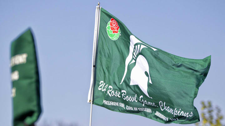 Oct 25, 2014; East Lansing, MI, USA; General view Rose bowl flag flying over stadium  prior to a game between the Michigan Wolverines and Michigan State Spartans at Spartan Stadium. Mandatory Credit: Mike Carter-Imagn Images