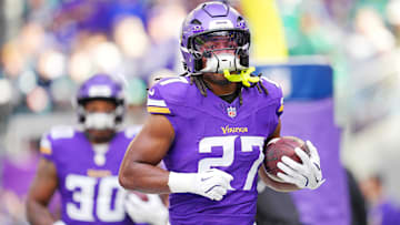 Oct 19, 2025; Minneapolis, Minnesota, USA; Minnesota Vikings running back Jordan Mason (27) warms up before the game against the Philadelphia Eagles at U.S. Bank Stadium. 