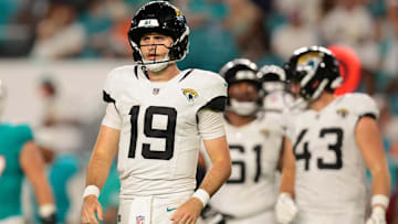 Aug 23, 2025; Miami Gardens, Florida, USA; Jacksonville Jaguars quarterback Seth Henigan (19) walks toward the sideline against the Miami Dolphins during the fourth quarter at Hard Rock Stadium. Mandatory Credit: Sam Navarro-Imagn Images