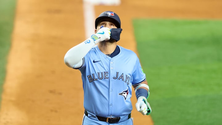 May 28, 2025; Arlington, Texas, USA; Toronto Blue Jays shortstop Bo Bichette (11) reacts after hitting a two-run home run during the ninth inning against the Texas Rangers at Globe Life Field. May 28, 2025; Arlington, Texas, USA; Toronto Blue Jays shortstop Bo Bichette (11) reacts after hitting a two-run home run during the ninth inning against the Texas Rangers at Globe Life Field.