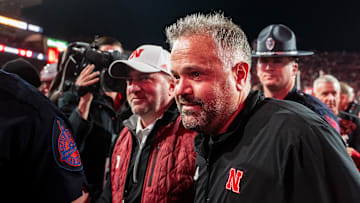 Nov 23, 2024; Lincoln, Nebraska, USA; Nebraska Cornhuskers head coach Matt Rhule and athletic director Troy Dannen walk off the field after defeating the Wisconsin Badgers at Memorial Stadium.