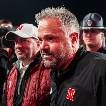 Nov 23, 2024; Lincoln, Nebraska, USA; Nebraska Cornhuskers head coach Matt Rhule and athletic director Troy Dannen walk off the field after defeating the Wisconsin Badgers at Memorial Stadium.