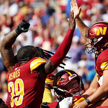 Sep 15, 2024; Landover, Maryland, USA; Washington Commanders place kicker Austin Seibert (3) celebrates with his teammates after making the game winning field goal against the New York Giants at Commanders Field. Mandatory Credit: Peter Casey-Imagn Images