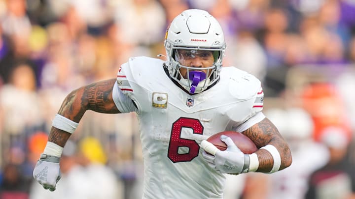 Dec 1, 2024; Minneapolis, Minnesota, USA; Arizona Cardinals running back James Conner (6) runs with the ball against the Minnesota Vikings in the second quarter at U.S. Bank Stadium. Mandatory Credit: Brad Rempel-Imagn Images