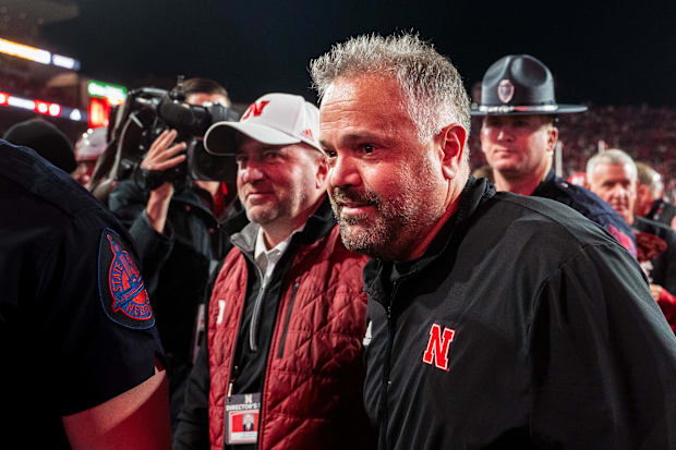Nebraska Cornhuskers head coach Matt Rhule and athletic director Troy Dannen walk off the field after defeating Wisconsin.