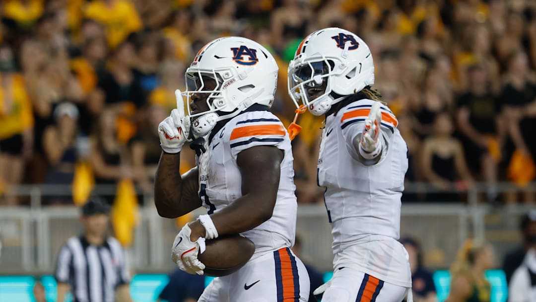 Aug 29, 2025; Waco, Texas, USA;  Auburn Tigers running back Damari Alston (0) celebrates after scoring a touchdown against the Baylor Bears during the first half at McLane Stadium. Mandatory Credit: Chris Jones-Imagn Images