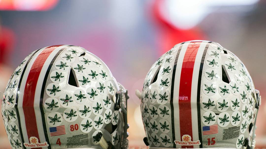 Jan 1, 2016; Glendale, AZ, USA; Two Ohio State Buckeyes helmets sit on the field during warmups before the 2016 Fiesta Bowl between the Notre Dame Fighting Irish and the Ohio State Buckeyesat University of Phoenix Stadium. Mandatory Credit: Matt Cashore-USA TODAY Sports