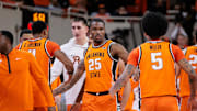 Nov 9, 2025; Stillwater, Oklahoma, USA; Oklahoma State Cowboys forward Robert Jennings (25) celebrates with teammates during the second half against the Texas A&M Aggies at Gallagher-Iba Arena. Mandatory Credit: William Purnell-Imagn Images