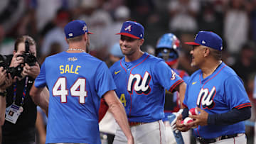 Jul 14, 2025; Atlanta, GA, USA; National League first baseman Matt Olson (28) of the Atlanta Braves shakes hands with National League pitcher Chris Sale (51) of the Atlanta Braves during the 2025 Home Run Derby at Truist Park. Mandatory Credit: Brett Davis-Imagn Images