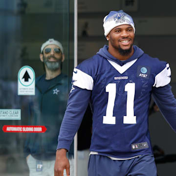 Dallas Cowboys defensive end Micah Parsons walks onto the practice field at the Ford Center at the Star Training Facility.