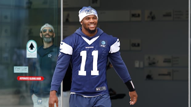 Dallas Cowboys defensive end Micah Parsons walks onto the practice field at the Ford Center at the Star Training Facility 