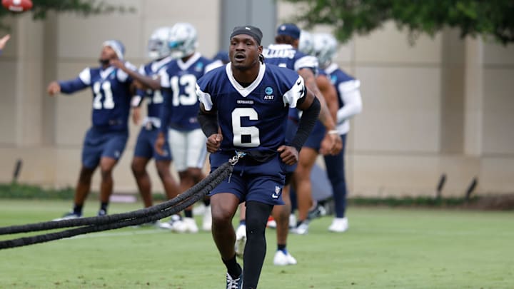 Jun 10, 2025; Arlington, TX, USA;  Dallas Cowboys safety Donovan Wilson (6) goes through a drill during practice at the Ford Center at the Star Training Facility in Frisco, Texas. Mandatory Credit: Chris Jones-Imagn Images
