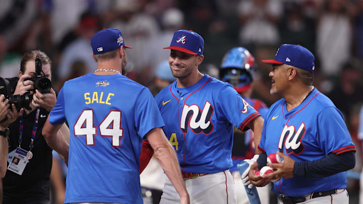 Jul 14, 2025; Atlanta, GA, USA; National League first baseman Matt Olson (28) of the Atlanta Braves shakes hands with National League pitcher Chris Sale (51) of the Atlanta Braves during the 2025 Home Run Derby at Truist Park. Mandatory Credit: Brett Davis-Imagn Images