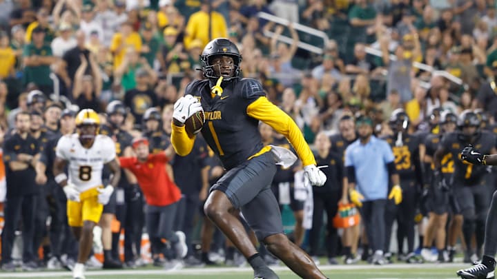 Sep 20, 2025; Waco, Texas, USA; Baylor Bears tight end Michael Trigg (1) runs the ball after a catch for a touchdown against the Arizona State Sun Devils during the second half at McLane Stadium. Mandatory Credit: Chris Jones-Imagn Images Sep 20, 2025; Waco, Texas, USA; Baylor Bears tight end Michael Trigg (1) runs the ball after a catch for a touchdown against the Arizona State Sun Devils during the second half at McLane Stadium. Mandatory Credit: Chris Jones-Imagn Images
