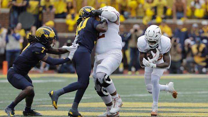 Sep 7, 2024; Ann Arbor, Michigan, USA; Texas Longhorns running back Quintrevion Wisner (26) rushes in the first half against the Michigan Wolverines at Michigan Stadium. Mandatory Credit: Rick Osentoski-Imagn Images