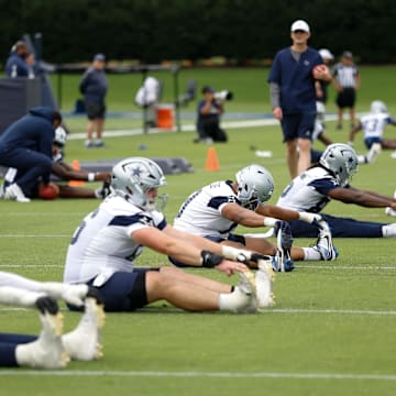 The Dallas Cowboys go through drills at the Ford Center at the Star Training Facility in Frisco, Texas.
