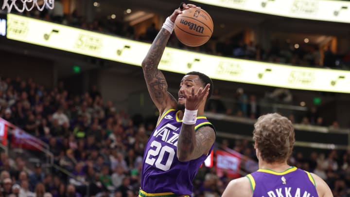 Oct 25, 2023; Salt Lake City, Utah, USA;  Utah Jazz forward John Collins (20) grabs a defensive rebound during the second quarter against the Sacramento Kings at Delta Center. Mandatory Credit: Chris Nicoll-USA TODAY Sports