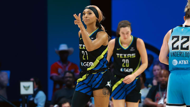 Dallas Wings guard DiJonai Carrington reacts against the Chicago Sky. Dallas Wings guard DiJonai Carrington reacts against the Chicago Sky.