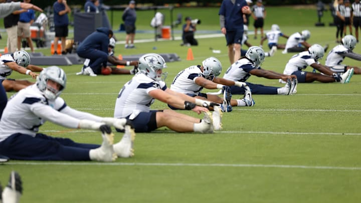 The Dallas Cowboys go through drills at the Ford Center at the Star Training Facility in Frisco, Texas