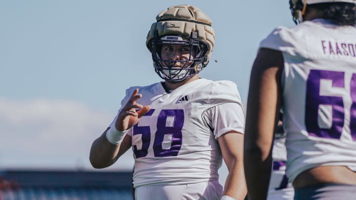 Zach Henning spent the spring at starting center out of UW need.