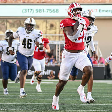 Indiana Hoosiers running back Elijah Green (21) runs for a touchdown against the Florida International Panthers at Memorial Stadium. 