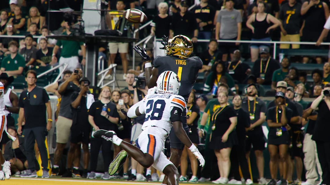 Aug 29, 2025; Waco, Texas: Baylor Bears tight end Michael Trigg catches a touchdown pass against Auburn Tigers safety Kensley Louidor-Faustin during the second half at McLane Stadium. Mandatory Credit: Chris Jones-Imagn Images